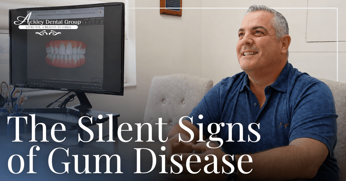 The Silent Signs of Gum Disease patient smiling looking at dental scans